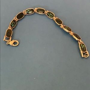 Silver bracelet with Bluish stones design